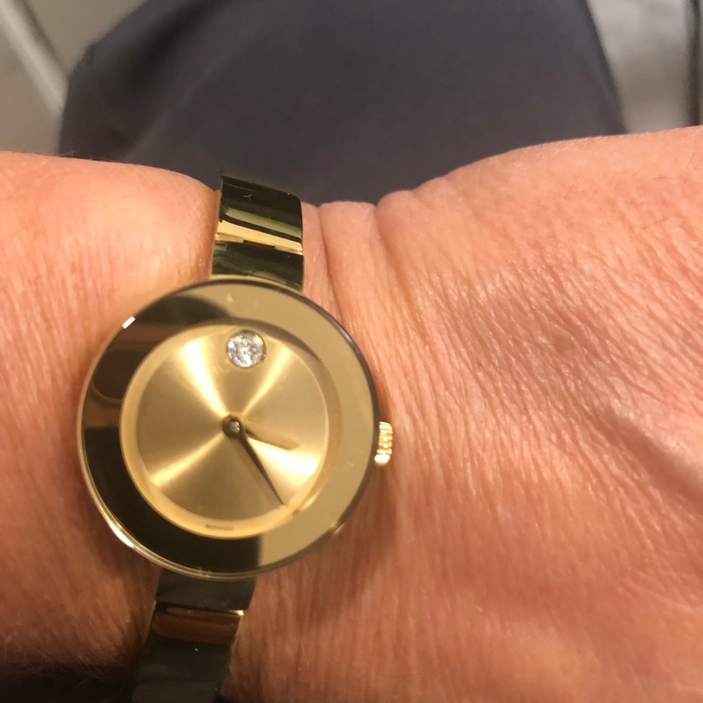 Woman’s gold Movado Bold 24 mm case.